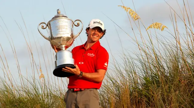 Rory McIlroy holds the Wanamaker trophy