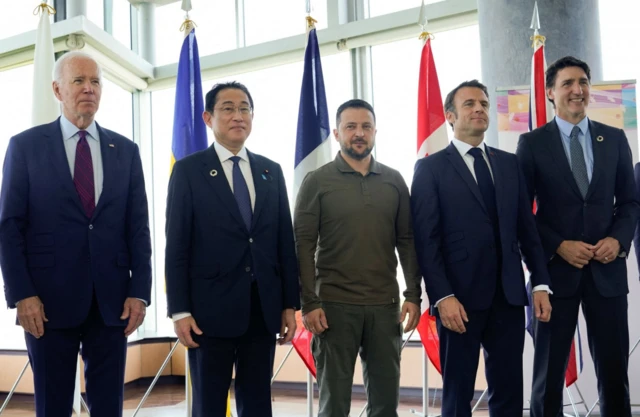 (L-R) US President Joe Biden, Japanese PM Fumio Kishida, Ukraine President Volodymyr Zelensky, French President Emmanul Macron and Canada's PM Justin Trudeau