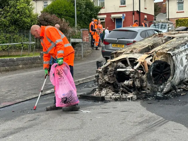 Council worker picking litter