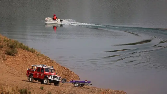 Police search for Madeleine McCann in an inflatable boat