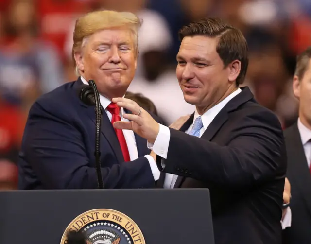 DeSantis with Trump at event