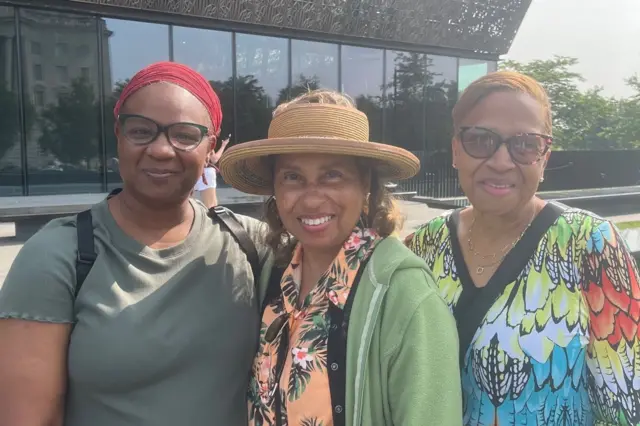 Simone, Brenda and Marlene pose for a photo