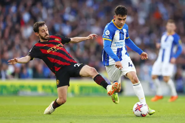 Bernardo Silva goes in for a challenge