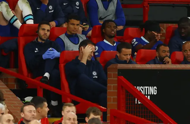 Frank Lampard with his head in his hands
