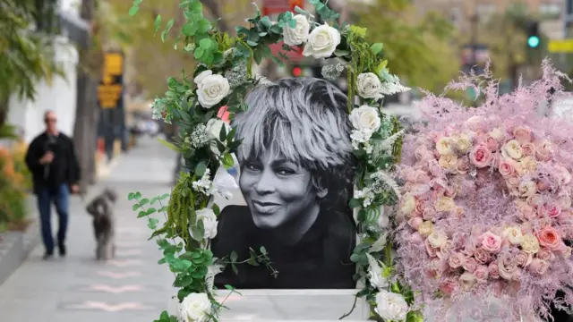 A photo of Turner adorned with flowers on the Hollywood Walk of Fame in Los Angeles