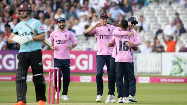 Nathan Fernandes celebrates wicket