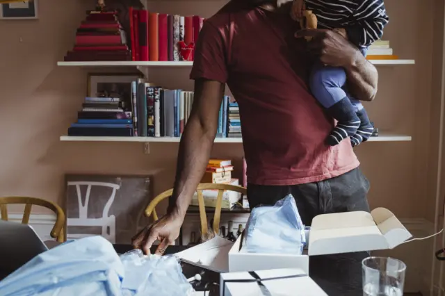 A man holding a child