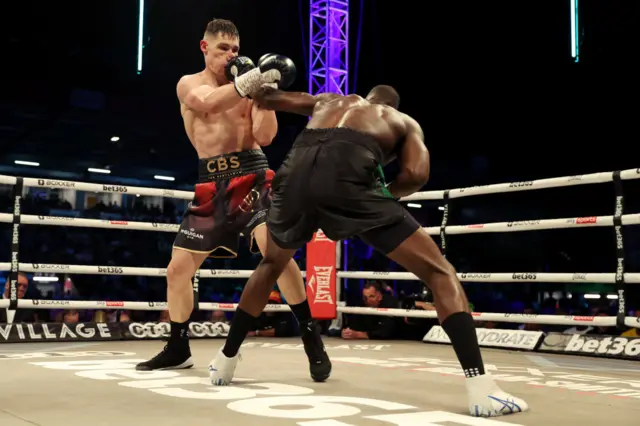 Lawrence Okolie punches Chris Billam-Smith