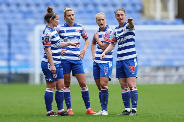 Reading players in discussion during WSL match