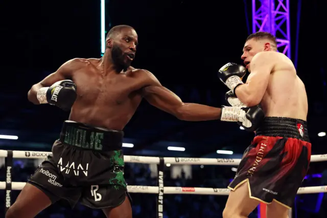 Lawrence Okolie punches Chris Billam-Smith in the body