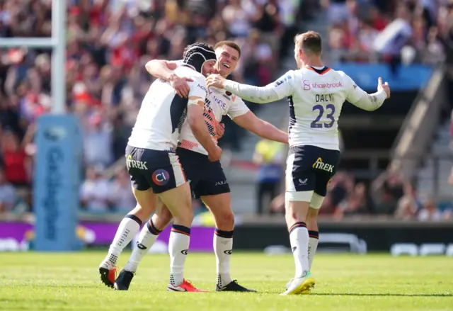 Saracens players celebrate at the final whistle