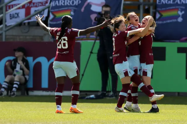 Emma Snerle celebrates with West Ham team-mates