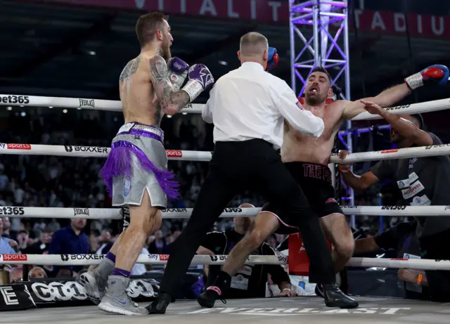 Sam Eggington stops his opponent