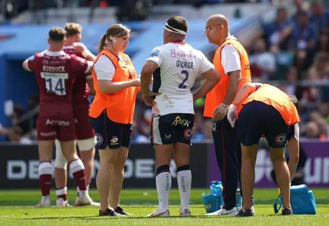 Jamie George receives treatment