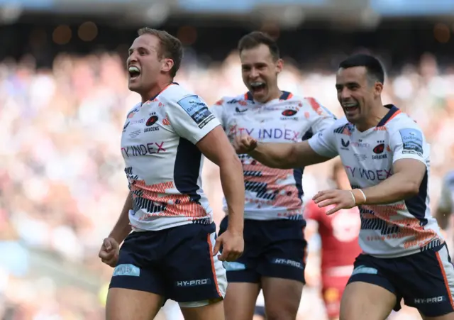 Max Malins celebrates his try