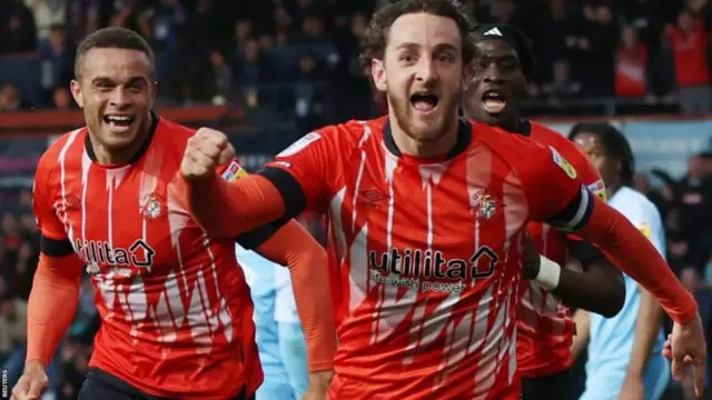 Tom Lockyer celebrates his crucial second-leg winner for Luton