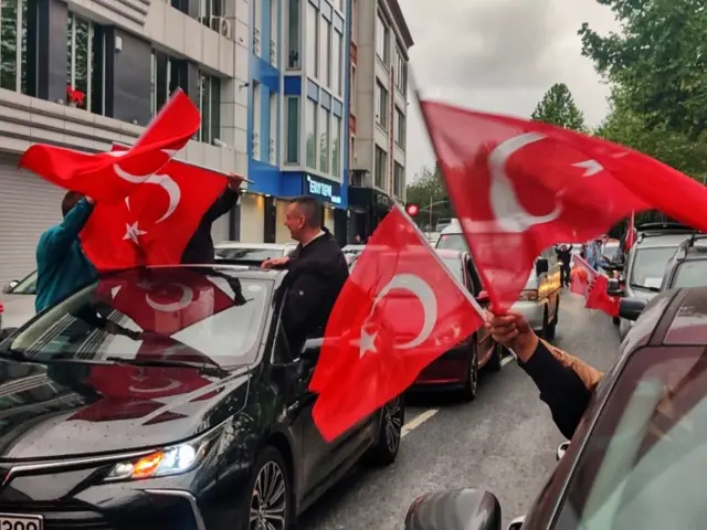 Turkish flags waved from cars