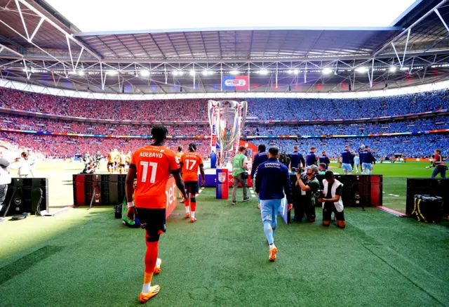 Luton and Coventry player walk out onto the Wembley pitch for the Championship play-off final on Saturday