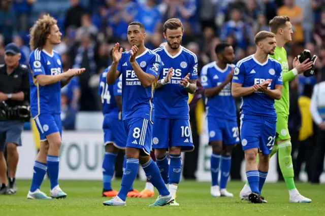 Leicester players clap fans