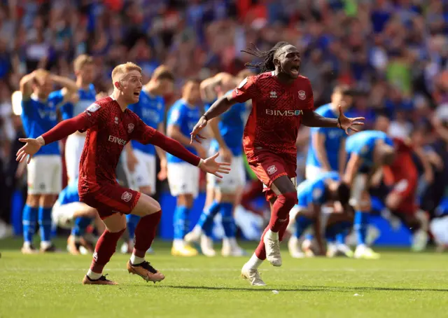 Carlisle players celebrate their penalty shootout win