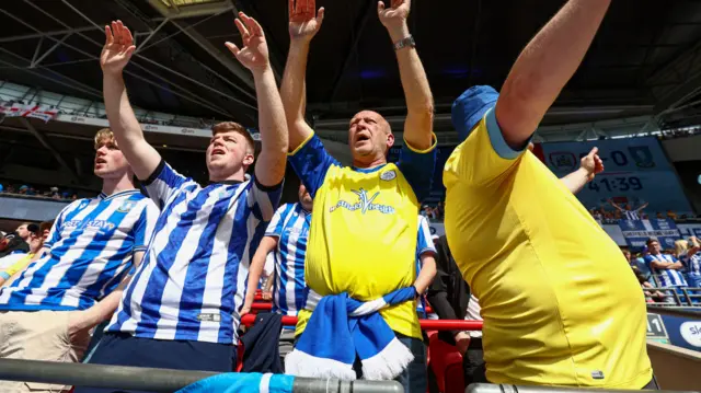 Sheffield Wednesday fans encourage their team