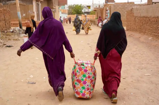 Women walking with bag