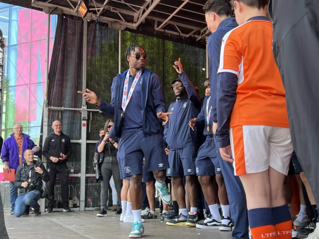 Luton Town players on stage