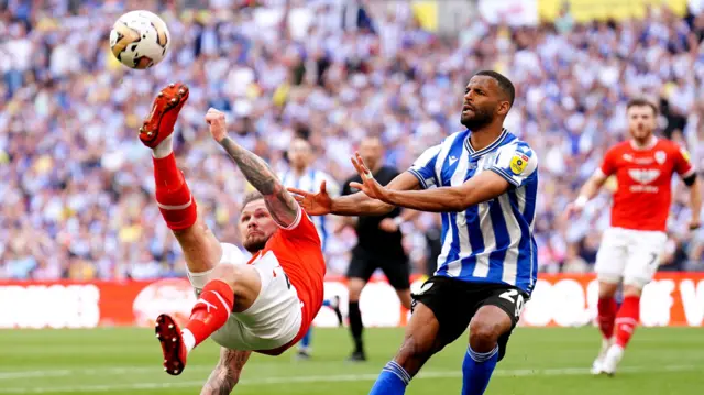 James Norwood tries an overhead kick