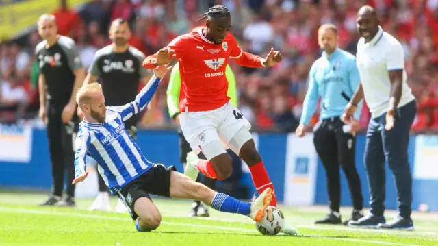 Barry Bannan tackles Devante Cole