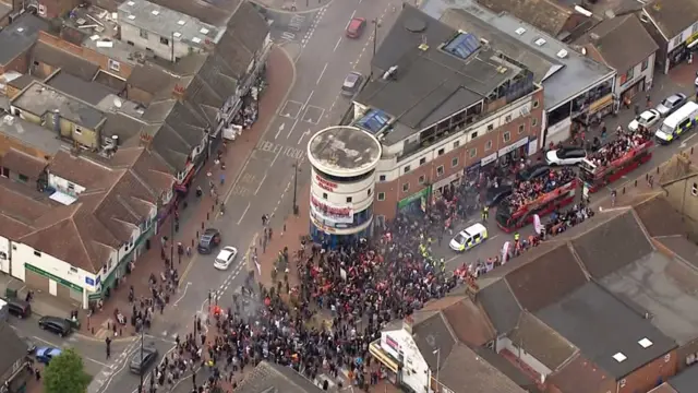 Luton Town on open top bus from the air