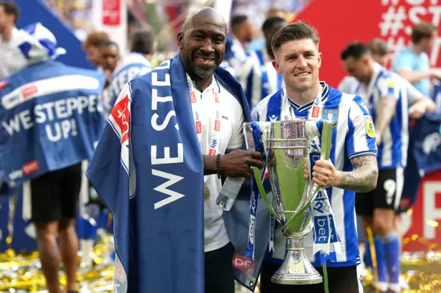 Darren Moore and Josh Windass with the trophy