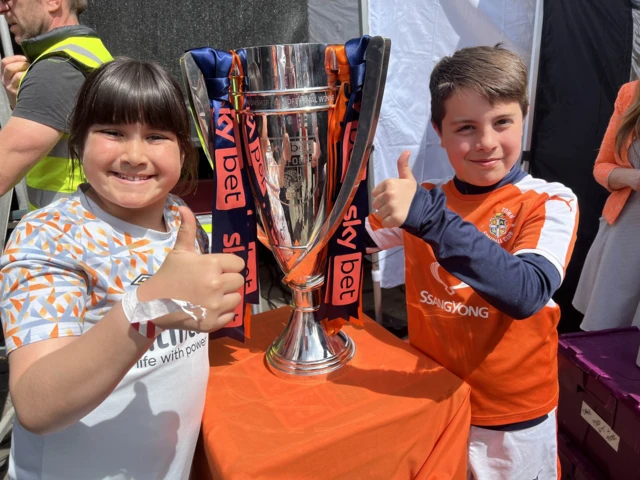 Grace and Zachary and Championship Trophy