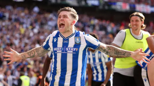 Josh Windass celebrates