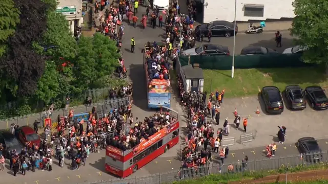 Luton Town on open top bus from the air