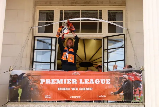 Rob Edwards with the play-off final trophy