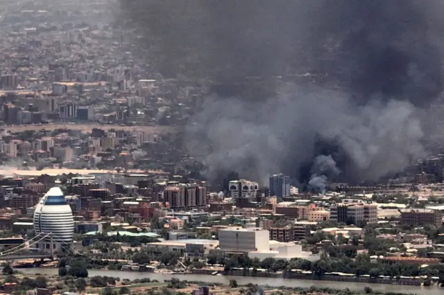 Smoke billows during fighting in the Sudanese capital Khartoum, on May 3, 2023