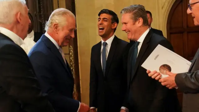 King Charles meets Sir Keir Starmer and Rishi Sunak during a reception in Westminster Hall