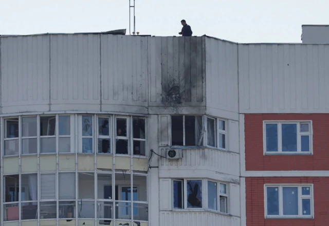 A damaged building on the outskirts of Moscow after authorities said several drones were shot down over the region