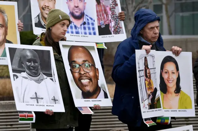 Families and friends who lost loved ones in the March 10, 2019, Boeing 737 Max crash in Ethiopia, hold a memorial protest in front of the Boeing headquarters in Arlington, Virginia, on March 10, 2023