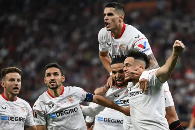 Sevilla players celebrate