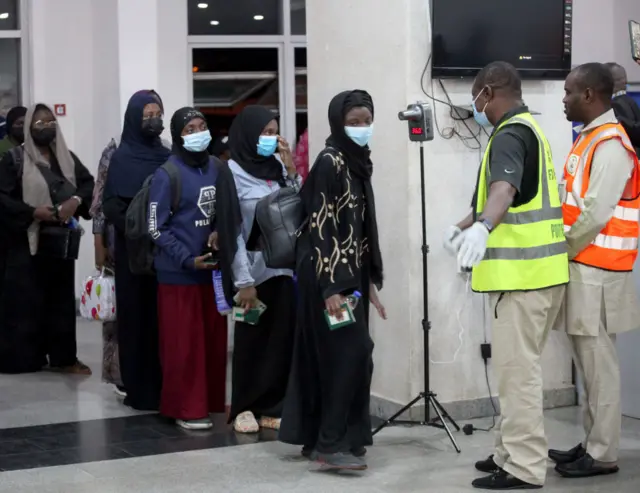 Nigerians evacuated from Sudan, due to clashes between the Sudanese army and paramilitary Rapid Support Forces (RSF) since April 15th, arrive at Abuja International Airport in Abuja, Nigeria on May 04, 2023.