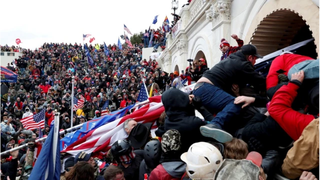 The crowd storming the Capitol on 6 January 2021