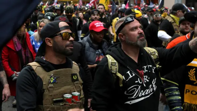 Proud Boys members Enrique Tarrio, left, and Joe Biggs march during a December 12, 2020 protest in Washington, D.C. Tarrio was later arrested for acts committed at the protest and Biggs was later arrested for his involvement in the storming of the U.S. Capitol building in Washington. D.C.