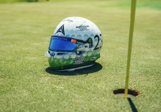 Alex Albon's golf ball race helmet