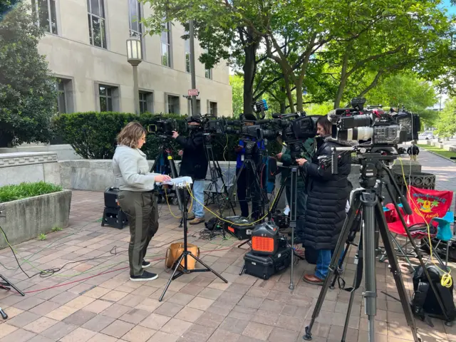 Reporters outside court