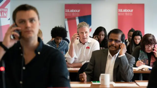 Labour leader Sir Keir Starmer joins members at the Labour Party national phone bank in London