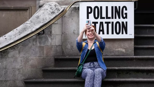 Woman takes a selfie at the polling station