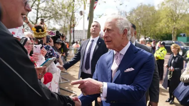 King Charles on a walkabout outside Buckingham Palace