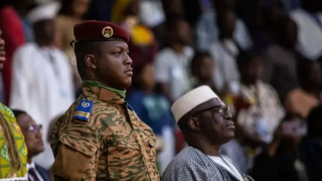 Burkina Faso military leader Captain Ibrahim Traore (C) attends the closing ceremony of the 28th Pan-African Film and television Festival (FESPACO), in Ouagadougou, on March 4, 2023. -