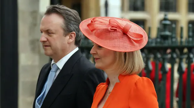 Former prime minister Liz Truss with her husband Hugh O'Leary arriving at Westminster Abbey